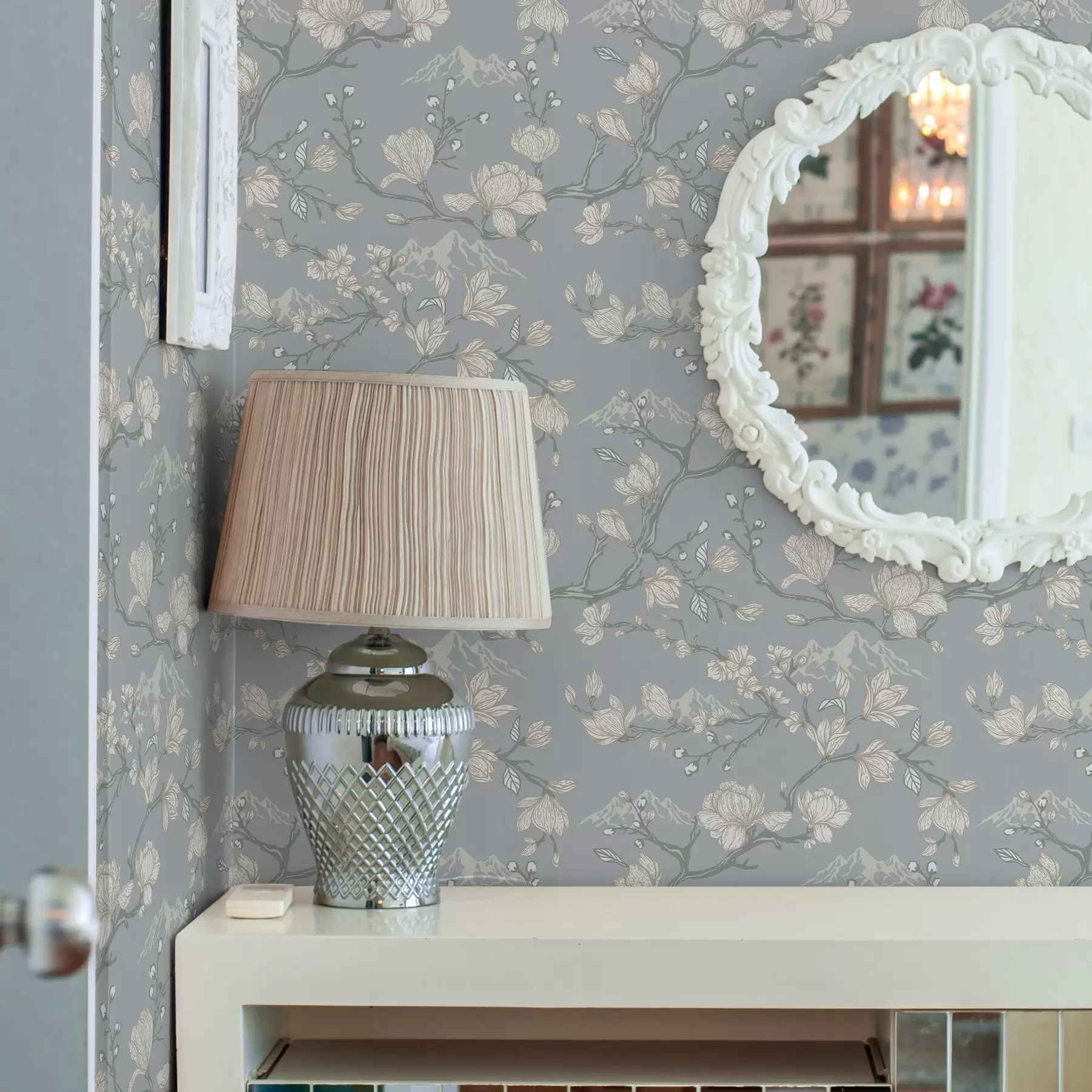 Фототапет Бели цветя върху клони и планини на син фон a00021